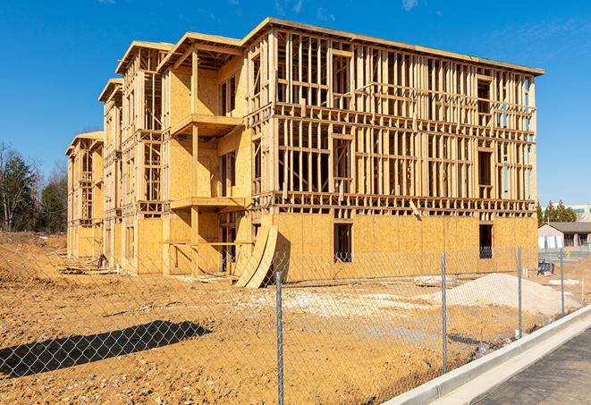 a snapshot of temporary chain link fences protecting a large construction project from unauthorized access in Franklin Park, NJ